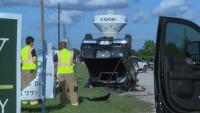 BREAKING: EMS transports driver after pickup truck flips over on Dishman Soccer Field road