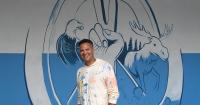 With message of peace, artist wraps 50-state project with Anchorage mural