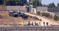 Israeli troops clash with settlers besieging Palestinian homes in occupied West Bank
