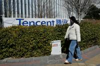 China’s Tencent profit down as AI push builds