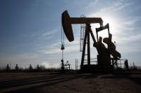 Oil prices little changed as investors weigh lower demand against U.S.-Iran talks deadlock