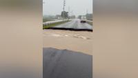 Video shows extreme flooding wash away part of roadway in Indiana
