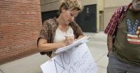 Sheriff's deputies detain data center petitioner Solberg at MontanaFair