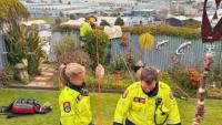 Firefighters use specialist gear to rescue Napier man who fell 25m while gardening