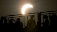 Solar eclipse watchers rejoice as Moon slides in front of Sun for once-in-a-lifetime celestial display
