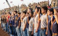 Saddle up: Military enlistees take the oath at the rodeo