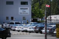 Amazon raises warehouse wages by $1 an hour across Canada amid union dispute