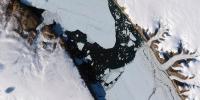 Large chunk of ice the size of Manhattan breaks away from glacier and forms icy island in Greenland