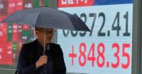 Asian shares mostly rise after buying of AI-related shares leads a rally on Wall Street