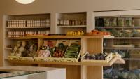 The Interiors of This New London Grocery Store Will Make You Want to Give This Once-Dated Kitchen Layout Another Go