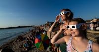 Islanders flock to the west coast to witness partial solar eclipse
