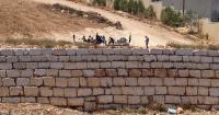 Settlers maintain siege of Palestinian homes in West Bank as army withdraws