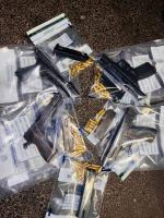 Four suspects in court after police seize four firearms and 74 rounds of ammunition