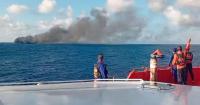 Indonesian rescuers evacuate dozens from ferry fire