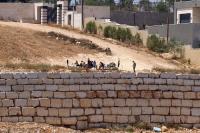 Israeli Settlers Besiege Palestinian Families In West Bank Village