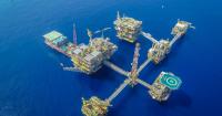 Oil Prices Slip As Demand Forecast Cuts Offset Middle East Supply Risks