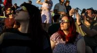 Dutch flock to beaches, squares for solar eclipse; At least one marriage proposal