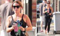 Coleen Rooney doesn't let 'extreme heat' warning get in the way of her daily workout as she heads to the gym as Britain faces one of its hottest days EVER