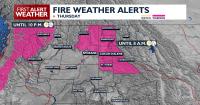 Thunderstorms linger in the mountains on a breezy, cooler Thursday