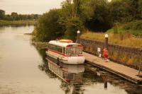 'A bit of craic': Northern Ireland artist launches Bus Boat after two-year build using old Belfast Citybus and wind turbine