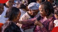 Photo of Rachel Ruto praying for woman at Reverend Teresia Wairimu's FEM conference moves Kenyans