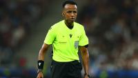 Banned Somalian referee sends five-word message to Donald Trump after making history