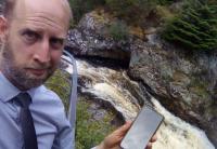 German cruise passenger thrilled after local tour guide and ghillie recover her mobile phone from Falls of Shin