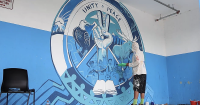 Artist completes 50-state peace mural project with final mural in Alaska