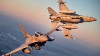 Nato scrambles fighter jets & shoots down suicide drone ‘pushed into Latvia by Russian electromagnetic warfare’