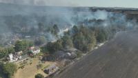 PM says UK must 'face up to climate change' amid wildfire