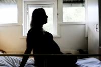 Surrogate who refused abortion gives birth to critically ill baby at centre of legal battle