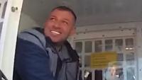Scarface drug dealer who fled to Scotland pictured grinning in cop van after he's snared in Thailand