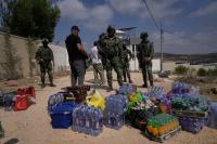 Palestinians besieged in West Bank village fear Israeli settlers will seize their homes