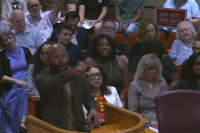 Man Arrested in Texas For Cussing at a County Meeting