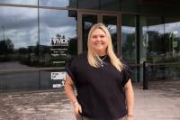 Meet the outreach coordinator who has a passion for people, animals, and education