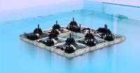 MIT's autonomous robotic tiles build floating structures on water
