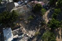 Colombia quake survivor faces life without triplet sisters