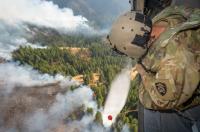 Oregon Guard HH-60 crew drops water on Hagen Fire, saving homes instead of Soldiers