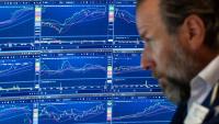 Stocks slip in cautious trading after weak US retail sales data