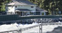 Juneau floodwaters recede as crews assess homes and inspect HESCO barriers