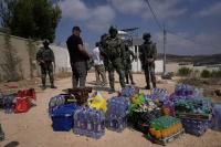Israeli soldiers block aid to Palestinians besieged in West Bank