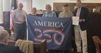 Athens officials receive first America 250 flag…