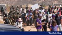 Activists rush aid to Palestinians besieged by settlers