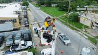 At least 2 tornadoes, 100-mph winds leave 500,000 without power in Illinois and Indiana