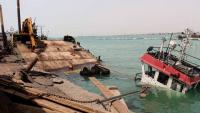 Yemen government says Houthi missiles kill four civilians in port city