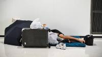 7,000 people sleep in Japan airport after 'extremely unusual' rains disrupt rails routes