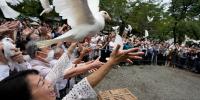 Japan's Defence Minister Koizumi prays at shrine seen by neighbours as symbol of Japanese militarism