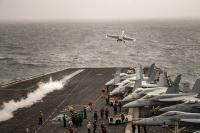 Navy carrier’s problems are tied to attacks on US base early in war