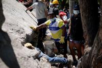 A tale of two buildings: how quake rescue efforts differed in Colombia and Venezuela