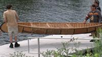 Forest County Potawatomi Tribal leaders launch canoes on Menomonee River